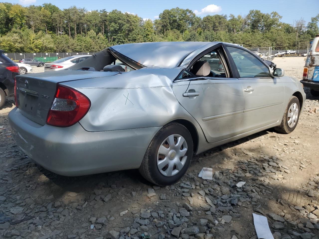 2004 Toyota Camry Le VIN: JTDBE32K740293458 Lot: 70655544