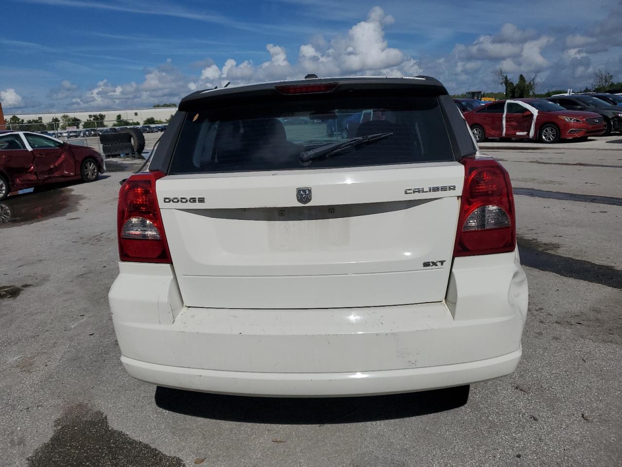 2010 Dodge Caliber Sxt VIN: 1B3CB4HA6AD605633 Lot: 70380684