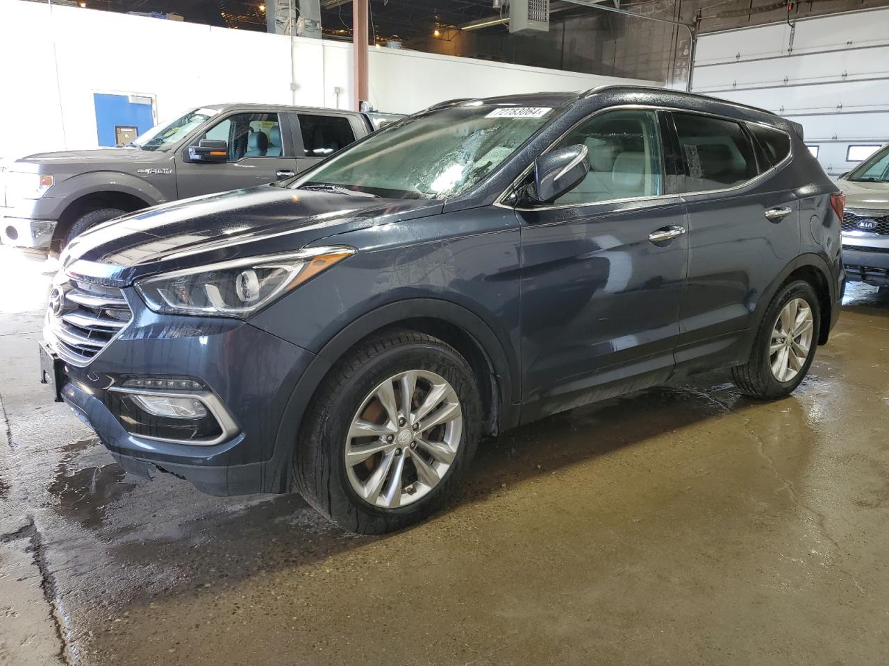 5NMZUDLA0HH048908 2017 HYUNDAI SANTA FE - Image 1