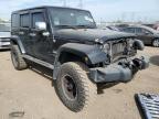 2012 Jeep Wrangler Unlimited Sahara للبيع في Elgin، IL - Front End