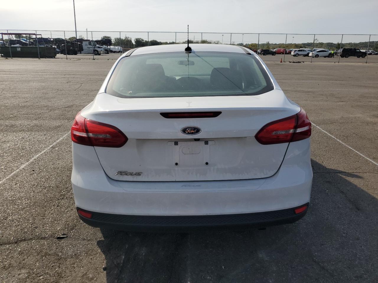 2016 Ford Focus S VIN: 1FADP3E2XGL215134 Lot: 71222864