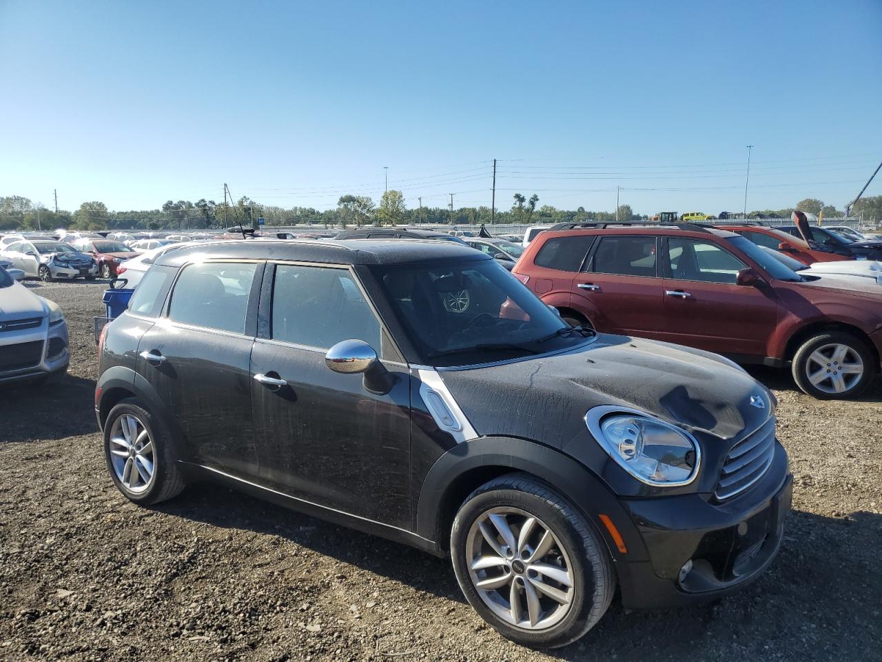 2011 Mini Cooper Countryman VIN: WMWZB3C57BWM00998 Lot: 73493294