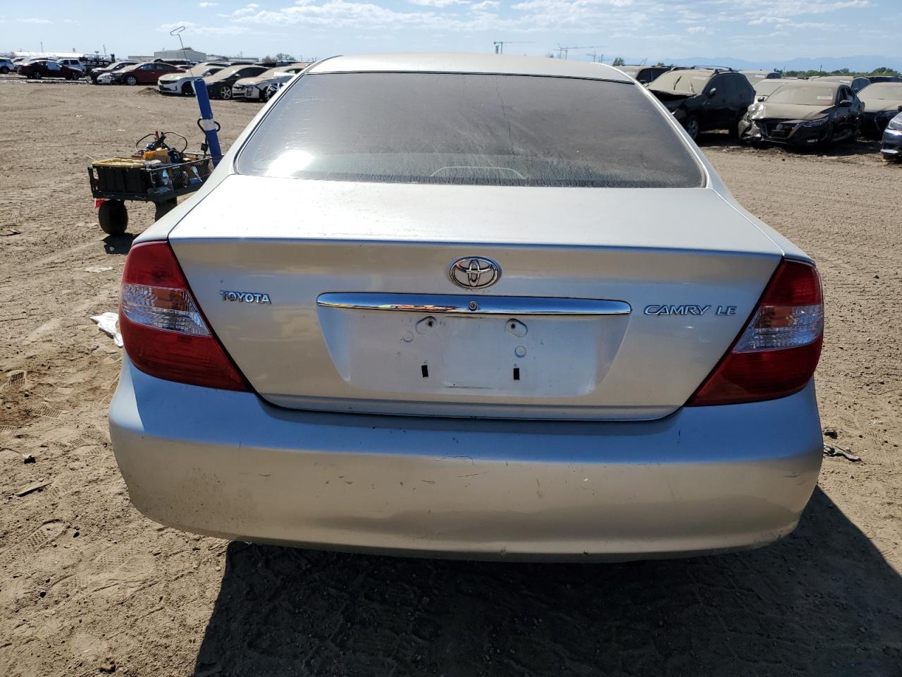 2003 Toyota Camry Le VIN: JTDBE32K130150200 Lot: 73133424