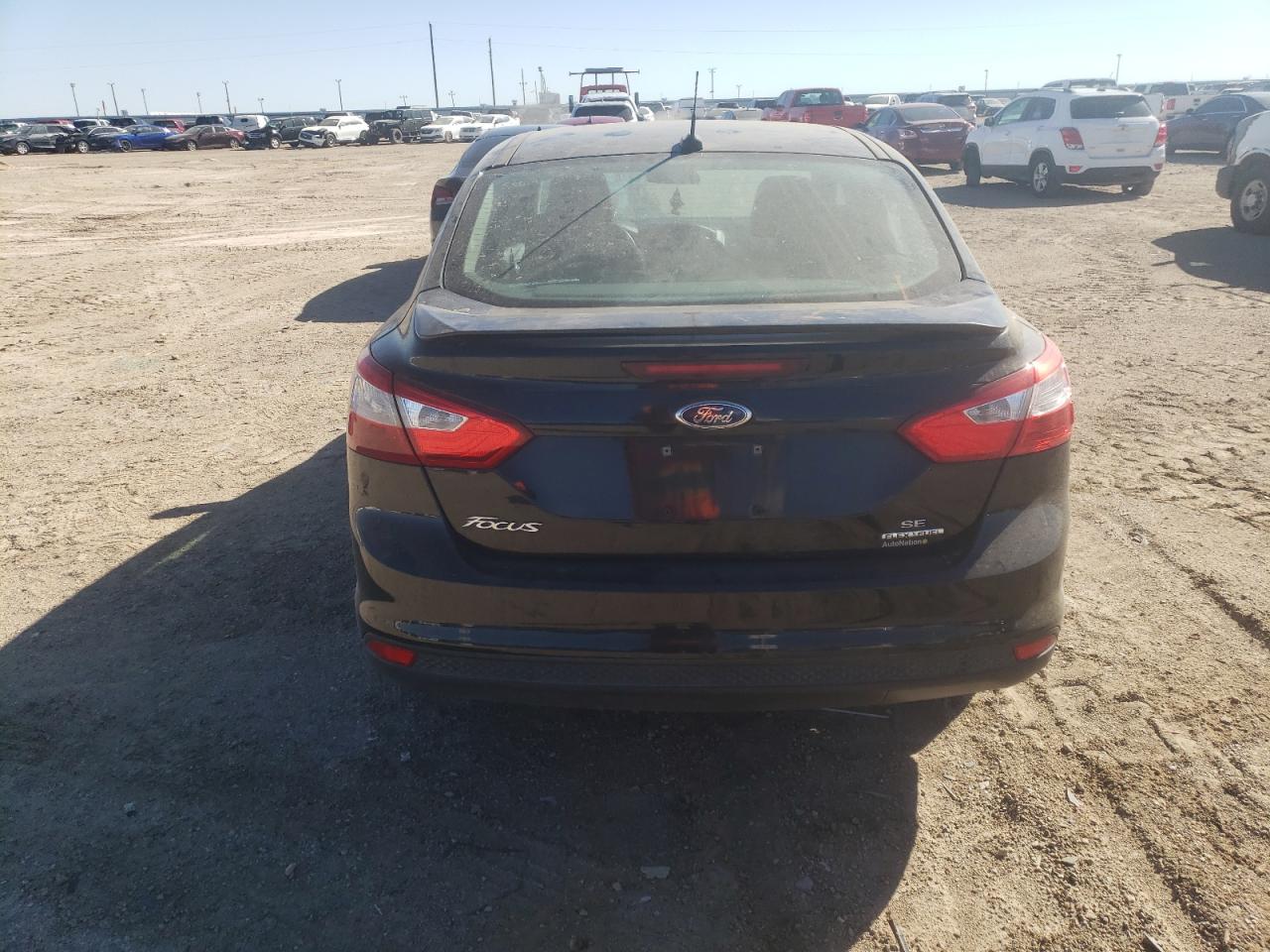 2014 Ford Focus Se VIN: 1FADP3F20EL325119 Lot: 72789714