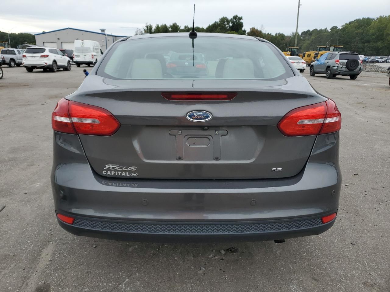 2015 Ford Focus Se VIN: 1FADP3F20FL253257 Lot: 72722544