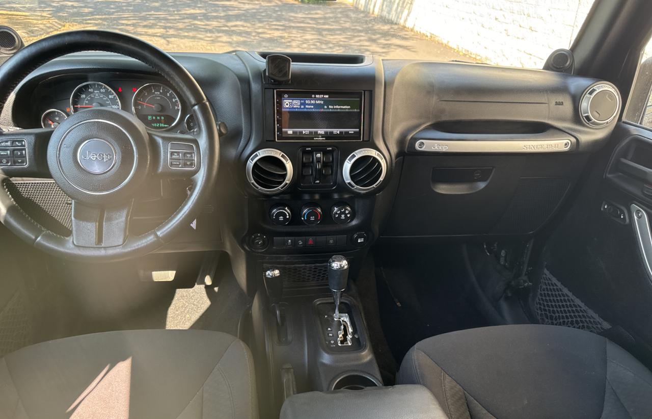 2014 Jeep Wrangler Unlimited Sahara VIN: 1C4BJWEG1EL210420 Lot: 70523844