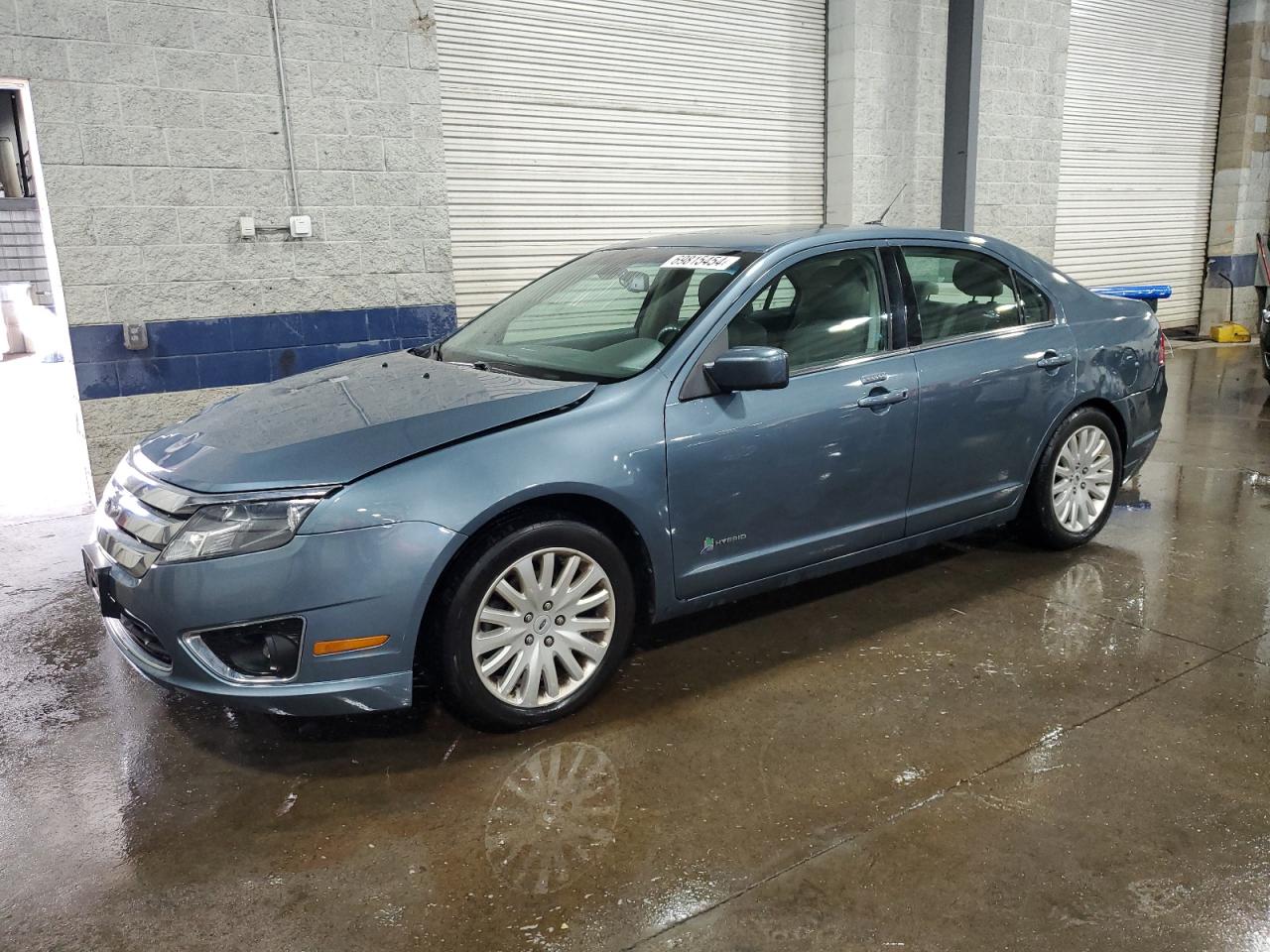 2011 Ford Fusion Hybrid VIN: 3FADP0L31BR234885 Lot: 69815454