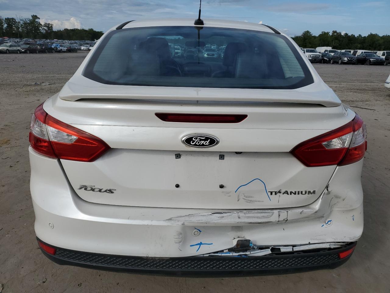 2014 Ford Focus Titanium VIN: 1FADP3J20EL317271 Lot: 72314434