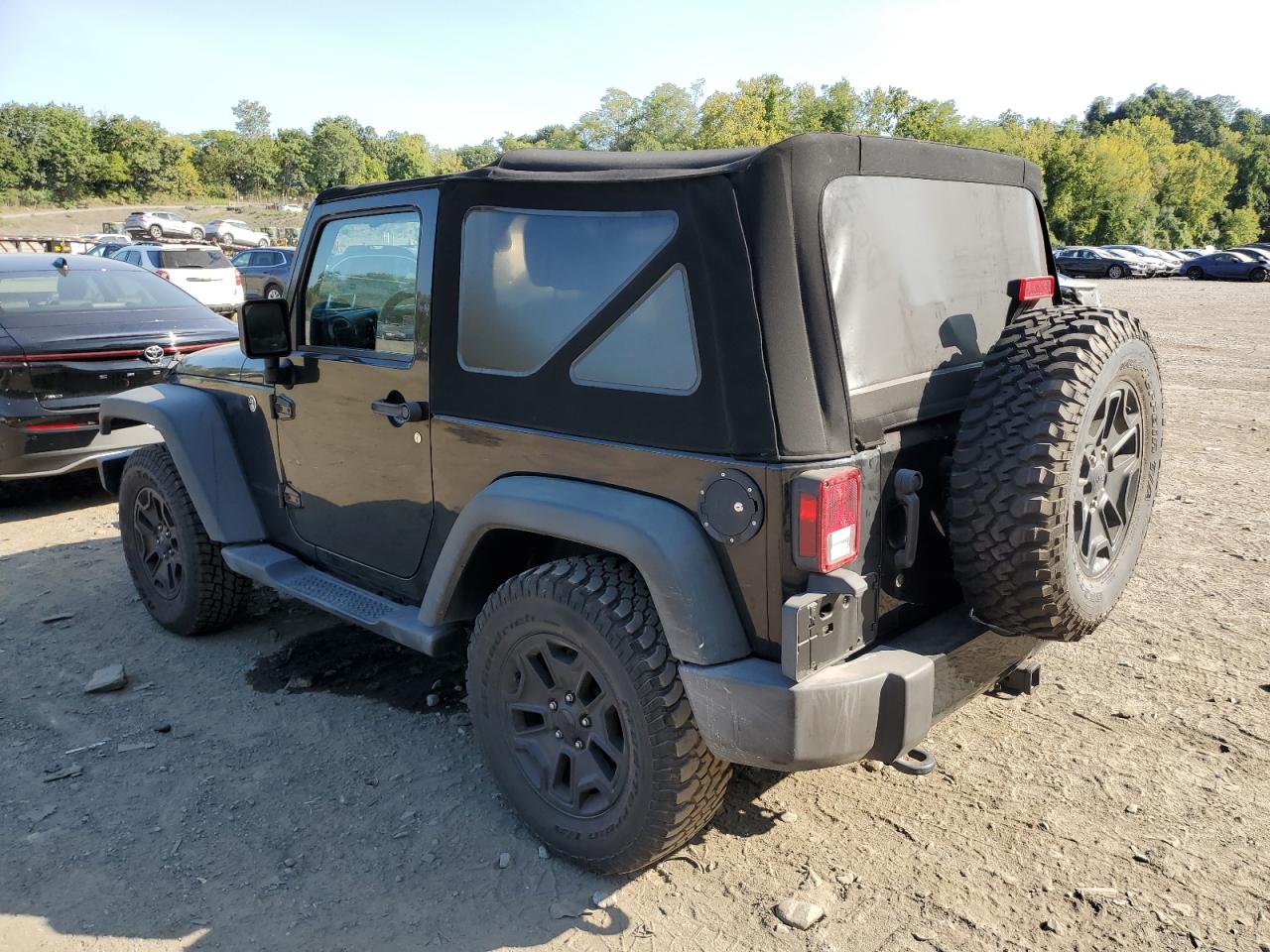 2016 Jeep Wrangler Sport VIN: 1C4AJWAG1GL150174 Lot: 71352454