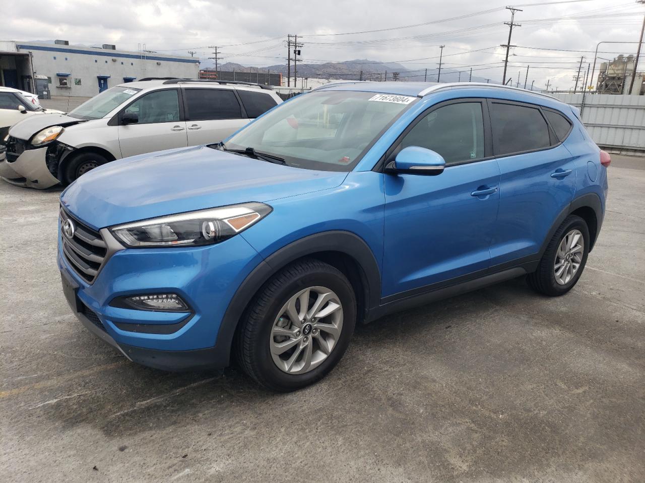 KM8J3CA22GU083863 2016 HYUNDAI TUCSON - Image 1