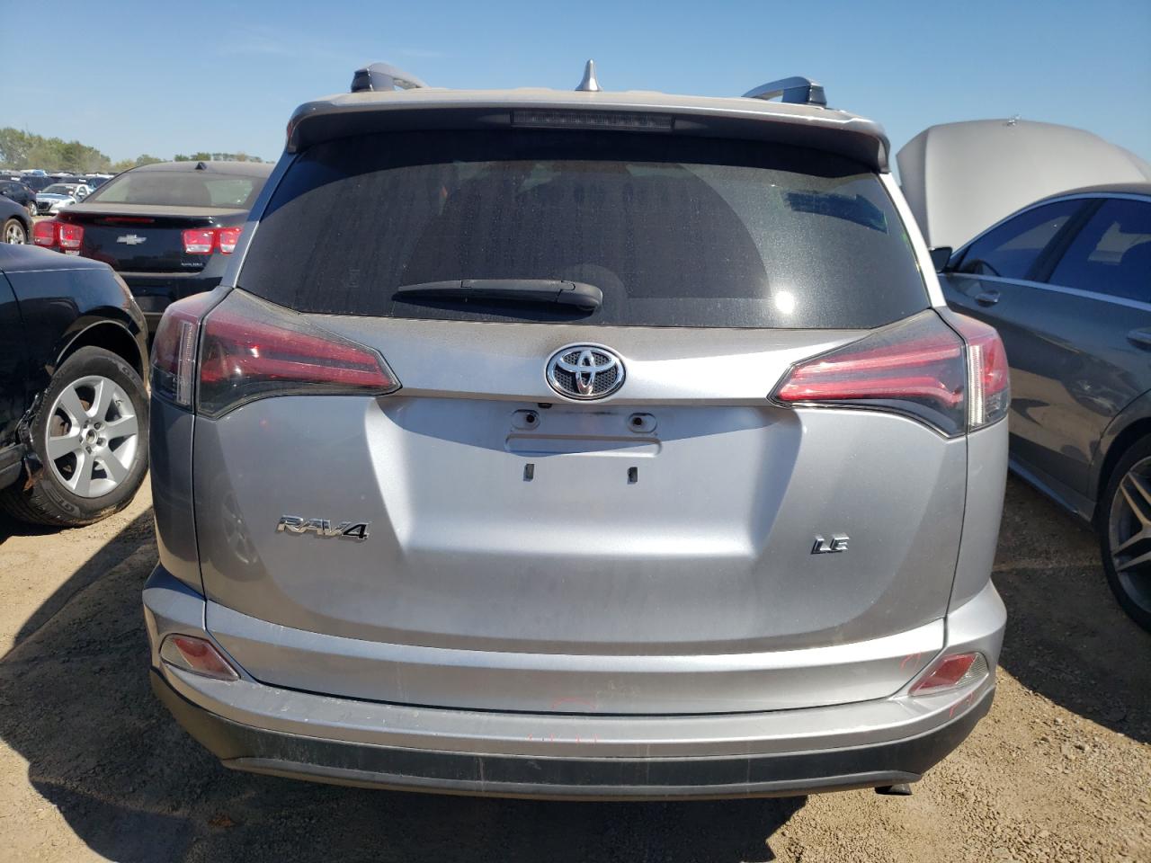 2018 Toyota Rav4 Le VIN: JTMZFREV7JJ170429 Lot: 69792964