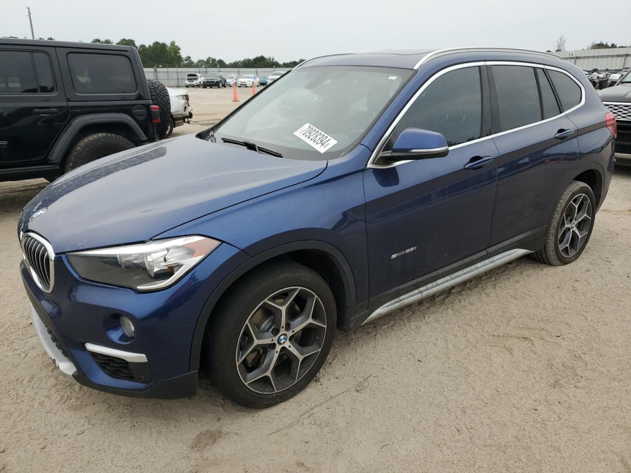 WBXHU7C33J5H38858 2018 BMW X1 - Image 1