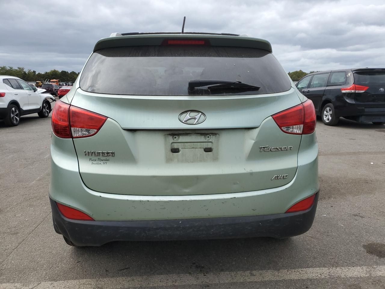 2012 Hyundai Tucson Gls VIN: KM8JUCACXCU385465 Lot: 72624814