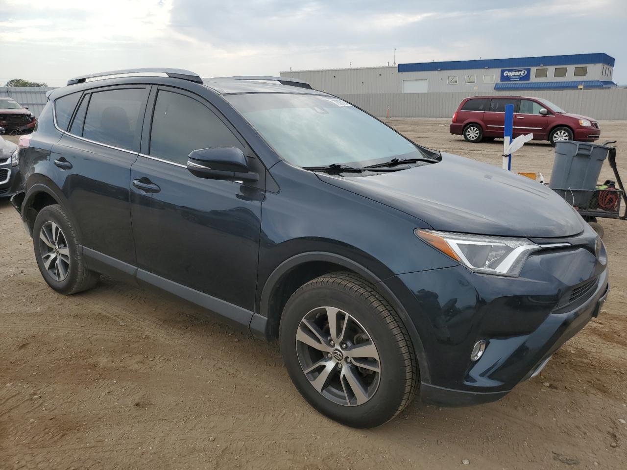 VIN JTMRFREV3JJ214412 2018 TOYOTA RAV4 no.4