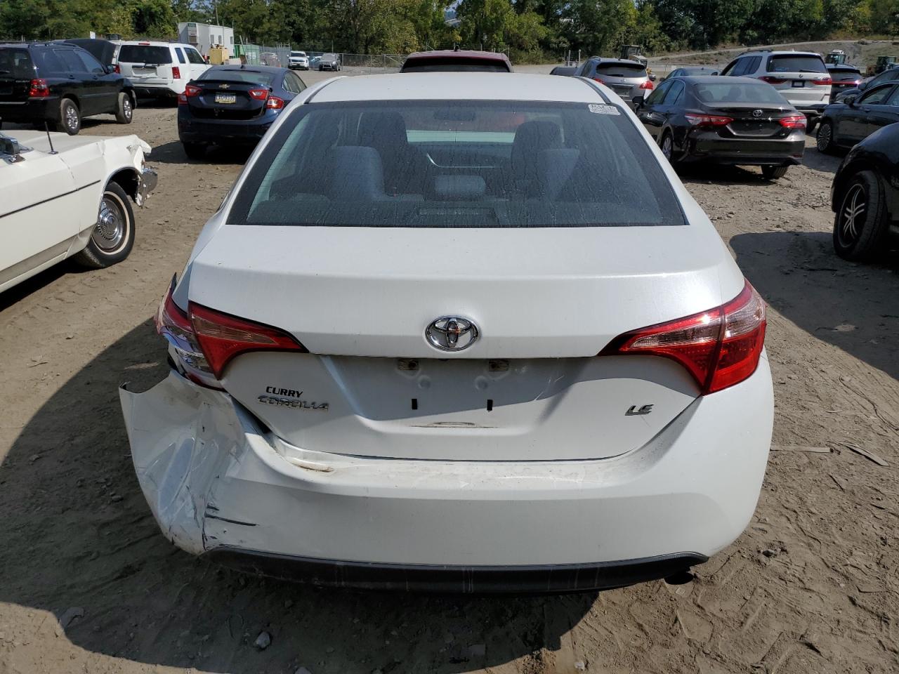 2018 Toyota Corolla L VIN: 5YFBURHE7JP835070 Lot: 69610534