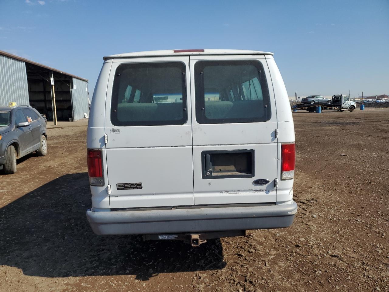 2004 Ford Econoline E350 Super Duty Wagon VIN: 1FBSS31LX4HB49234 Lot: 71131254