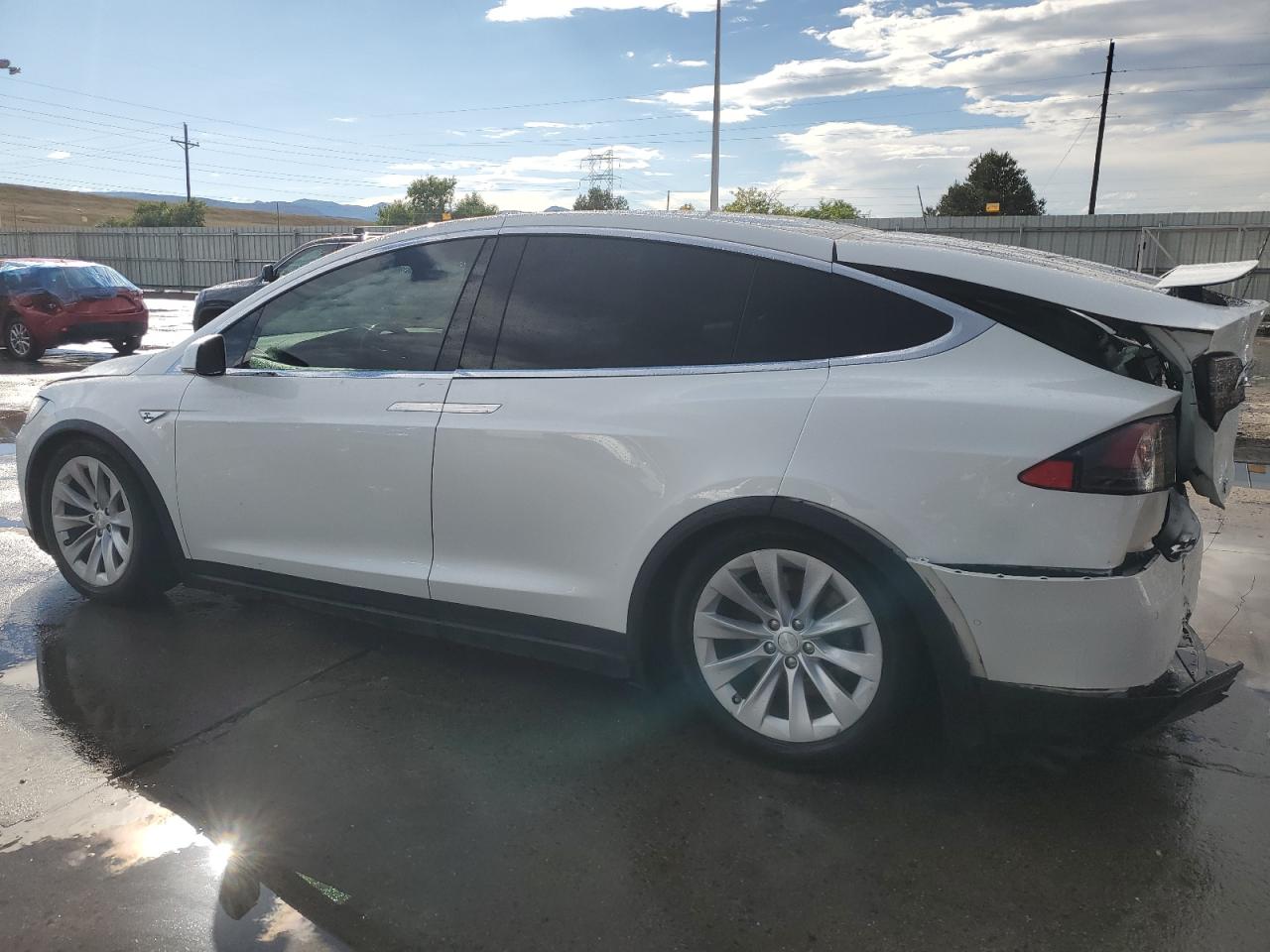 2016 Tesla Model X VIN: 5YJXCBE20GF005299 Lot: 69894204