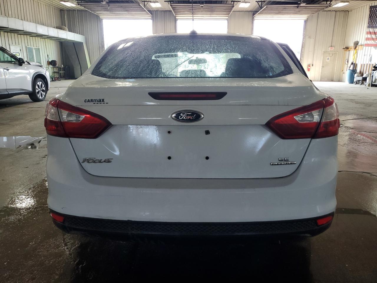 2014 Ford Focus Se VIN: 1FADP3F24EL429421 Lot: 71354664