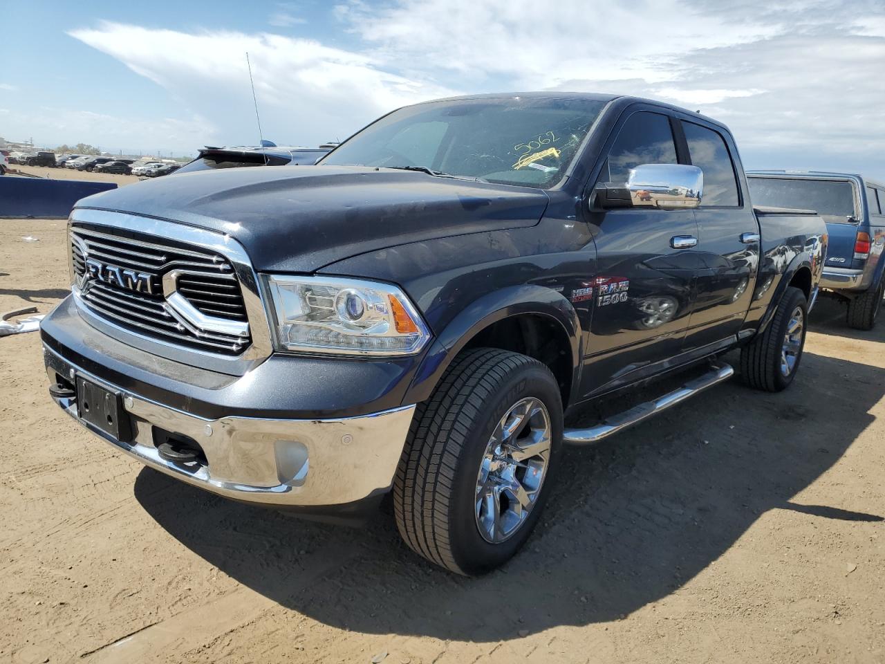 2015 Ram 1500 Laramie VIN: 1C6RR7VT9FS653083 Lot: 69993044