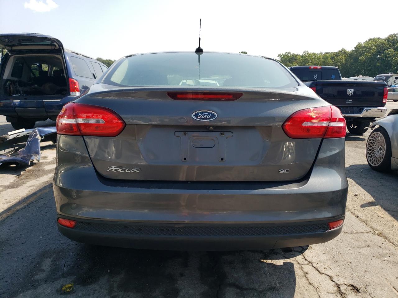 2016 Ford Focus Se VIN: 1FADP3F23GL230704 Lot: 70580204