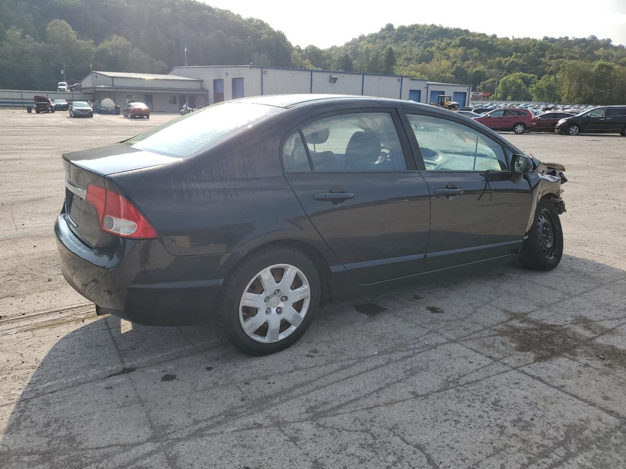 2009 Honda Civic Lx VIN: 19XFA165X9E031387 Lot: 70763424