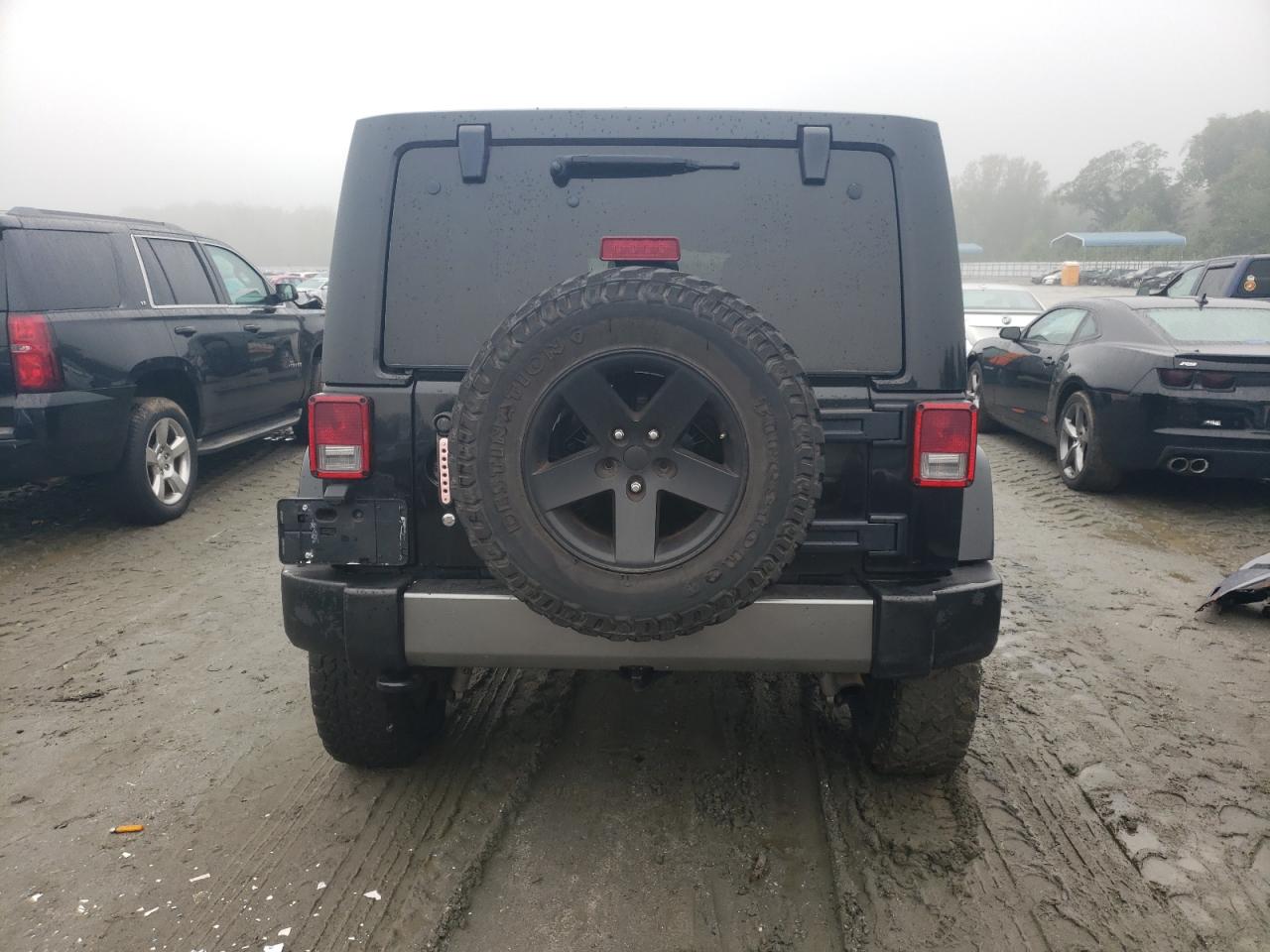 2011 Jeep Wrangler Unlimited Sport VIN: 1J4BA3H14BL633763 Lot: 69656314