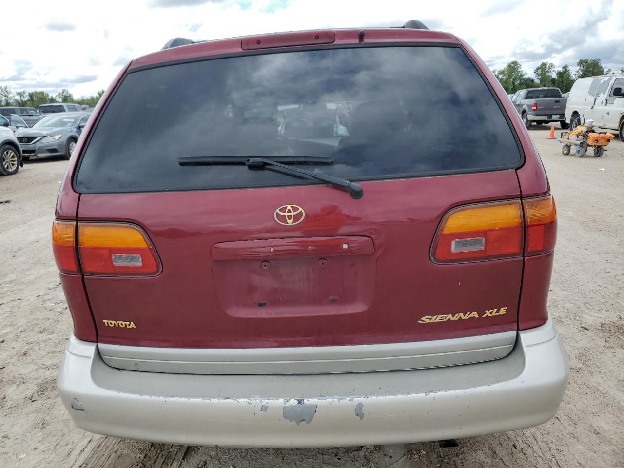 1999 Toyota Sienna Le VIN: 4T3ZF13C1XU135379 Lot: 79736214