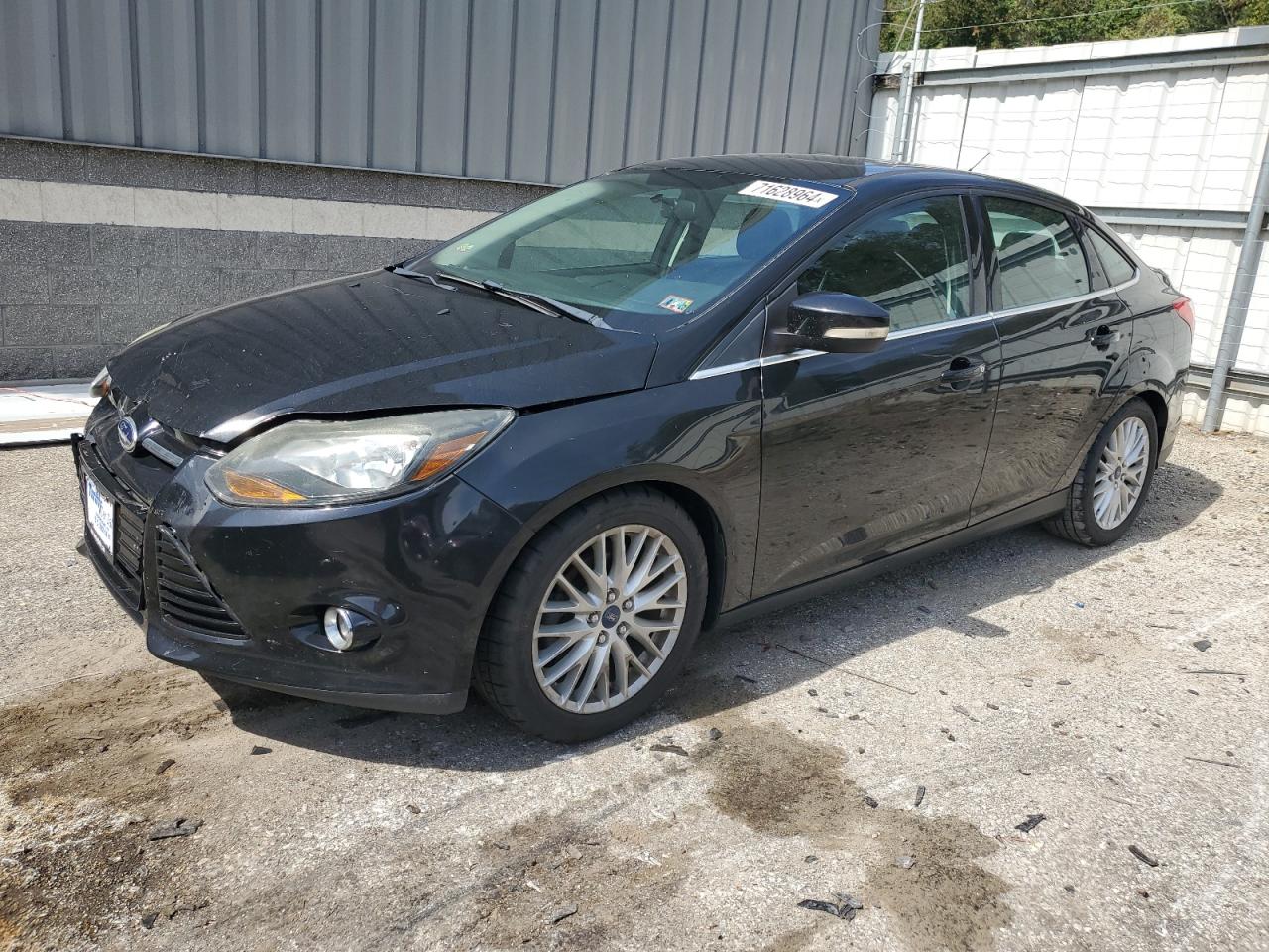 2014 Ford Focus Titanium VIN: 1FADP3J27EL311211 Lot: 71628964