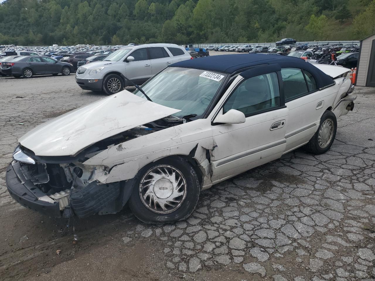 1998 Lincoln Continental VIN: 1LNFM97V8WY676657 Lot: 73322134