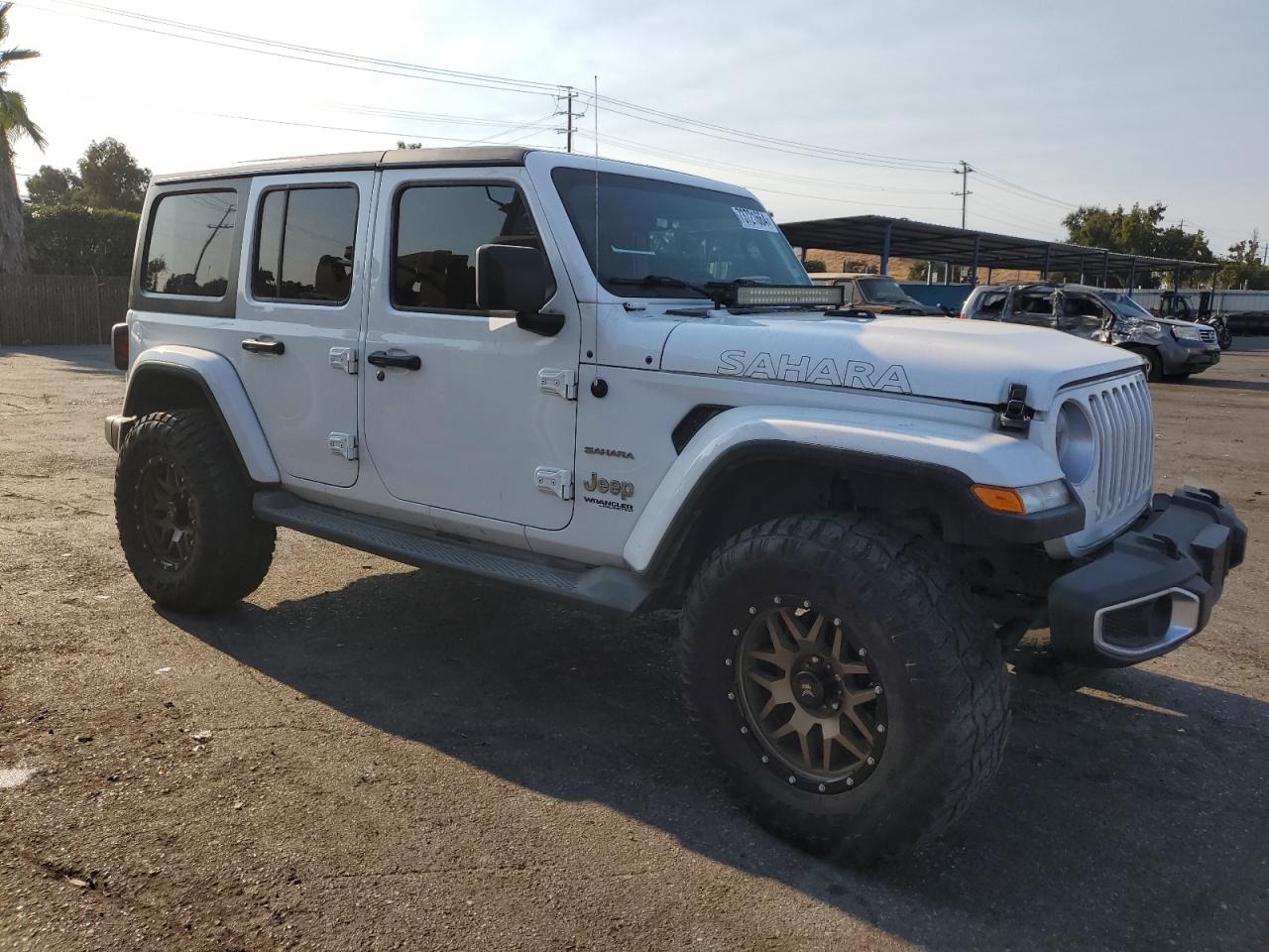 2019 Jeep Wrangler Unlimited Sahara VIN: 1C4HJXEG2KW528525 Lot: 73721664