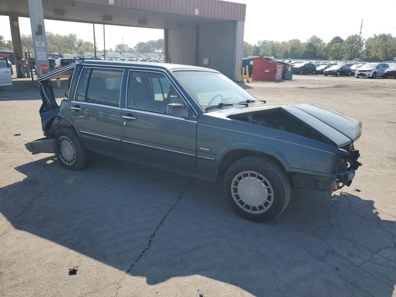 1990 Volvo 740 Base VIN: YV1FA8853L1296985 Lot: 72422494