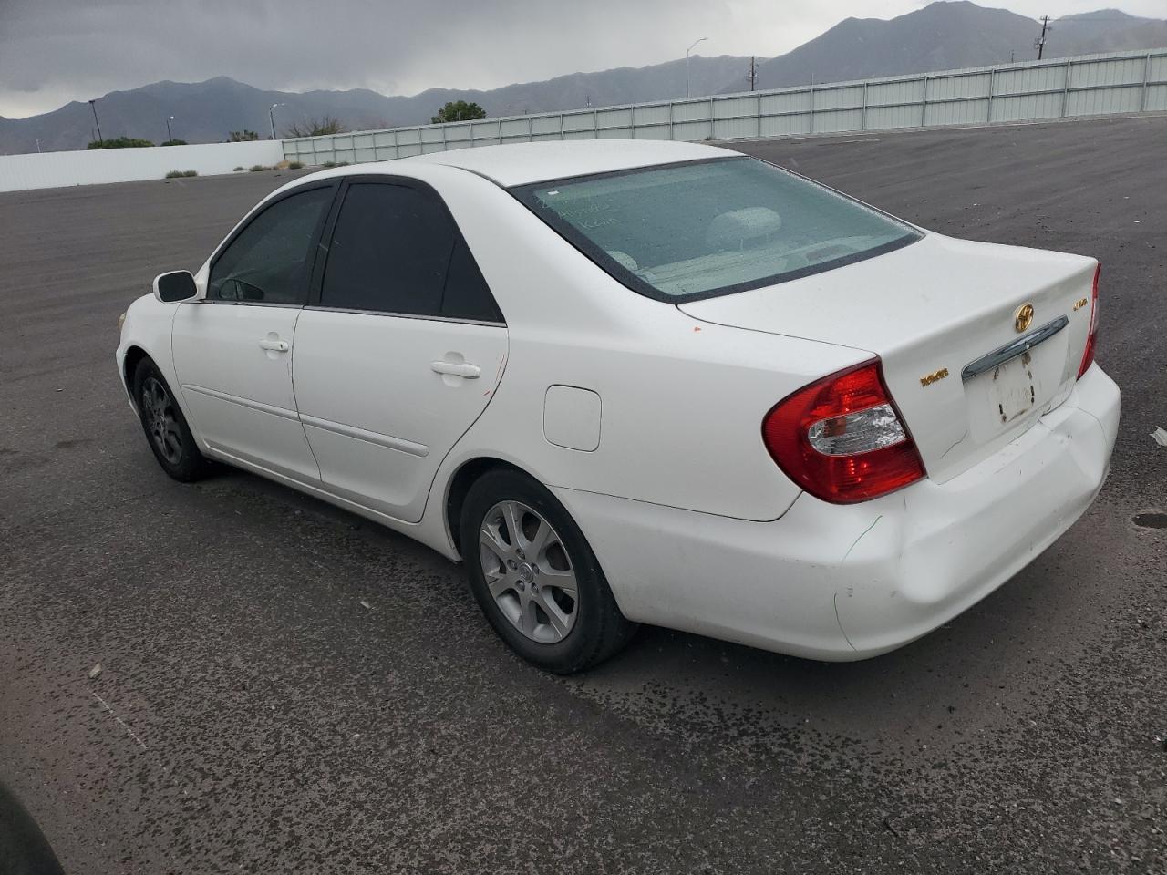 2004 Toyota Camry Le VIN: JTDBE30K940282321 Lot: 71794114