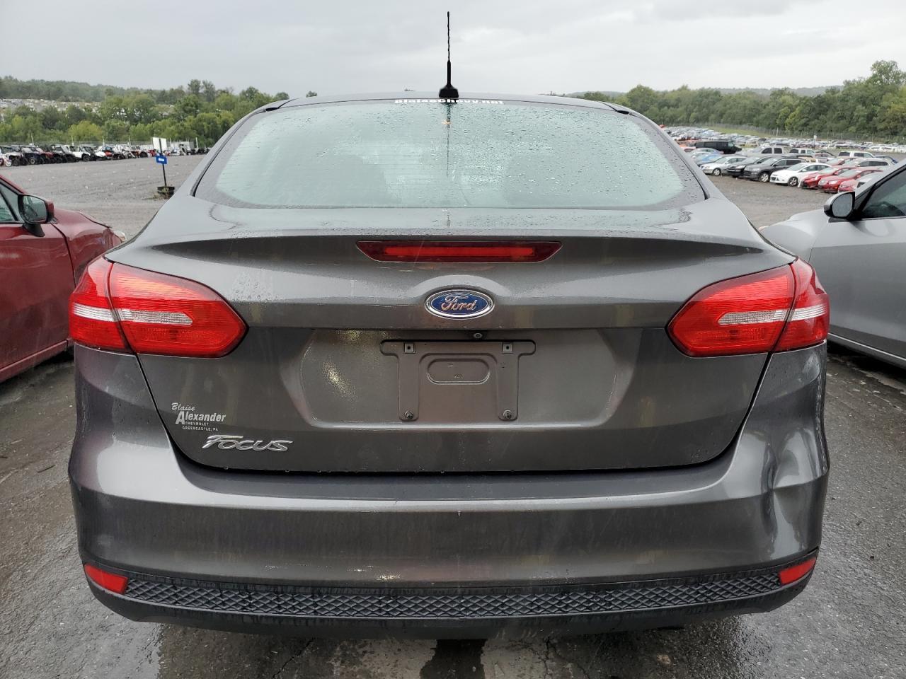 2015 Ford Focus S VIN: 1FADP3E24FL216245 Lot: 70665874