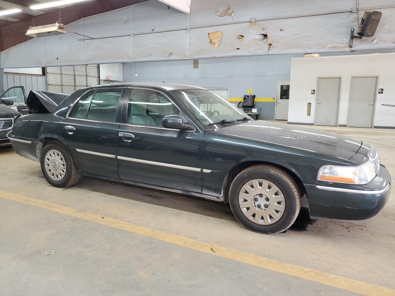 2003 Mercury Grand Marquis Gs VIN: 2MEFM74W63X609832 Lot: 70401464