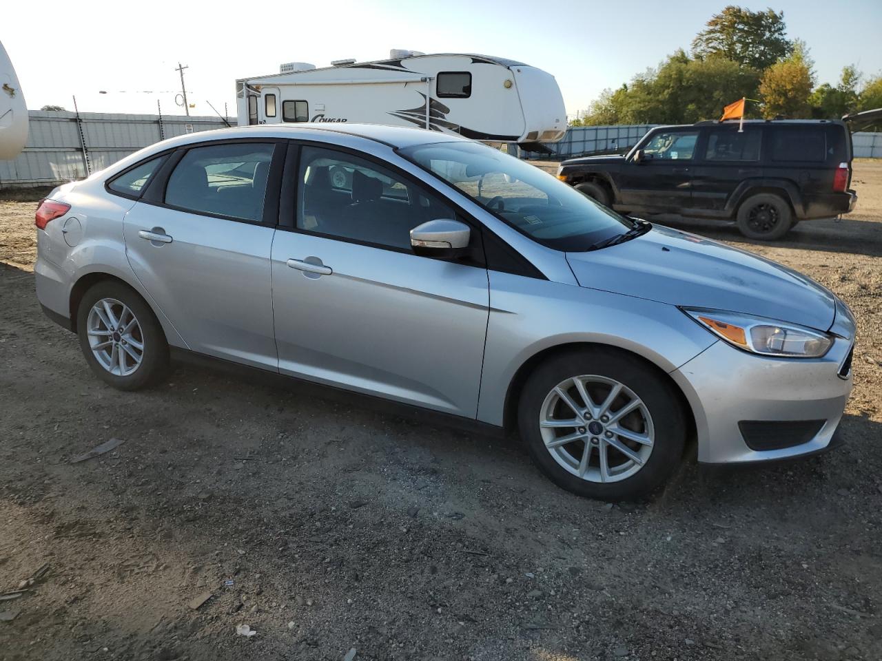 2017 Ford Focus Se VIN: 1FADP3F27HL340690 Lot: 70491274