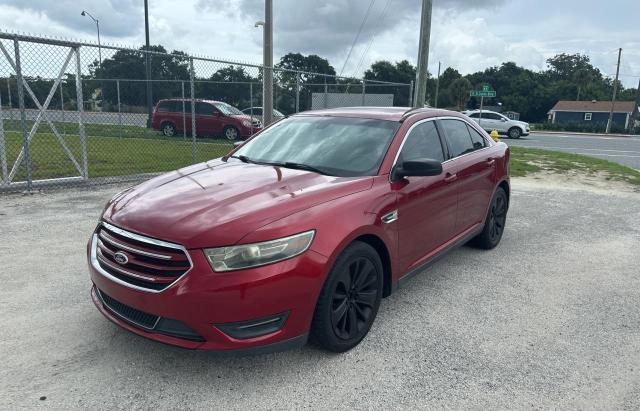 Седани FORD TAURUS 2014 Червоний