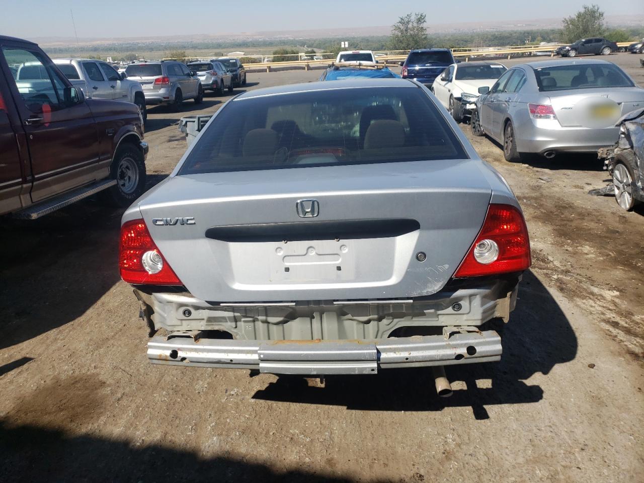 2005 Honda Civic Dx Vp VIN: 1HGEM211X5L033687 Lot: 73131594