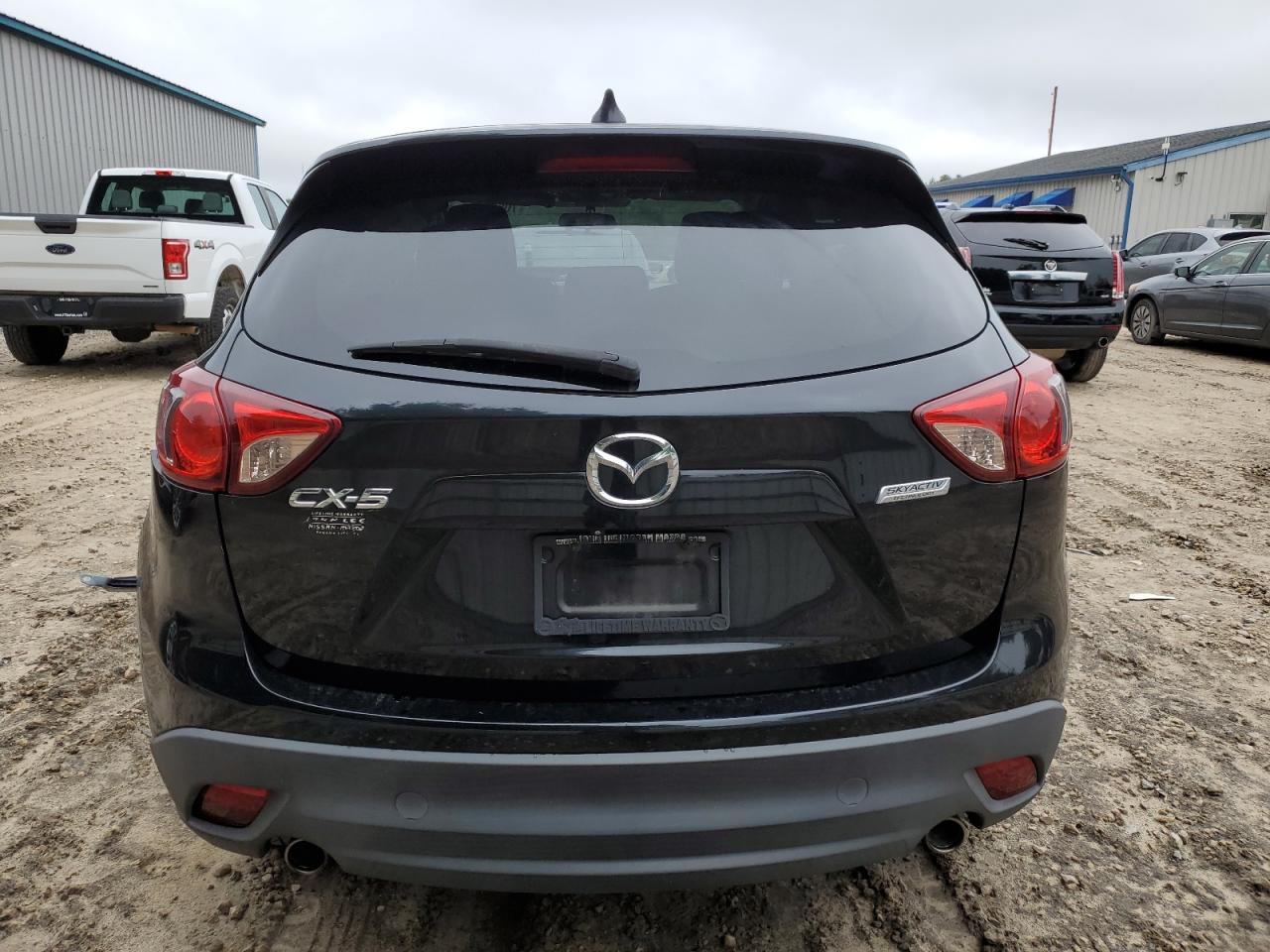 2014 Mazda Cx-5 Touring VIN: JM3KE2CY3E0424519 Lot: 70653184