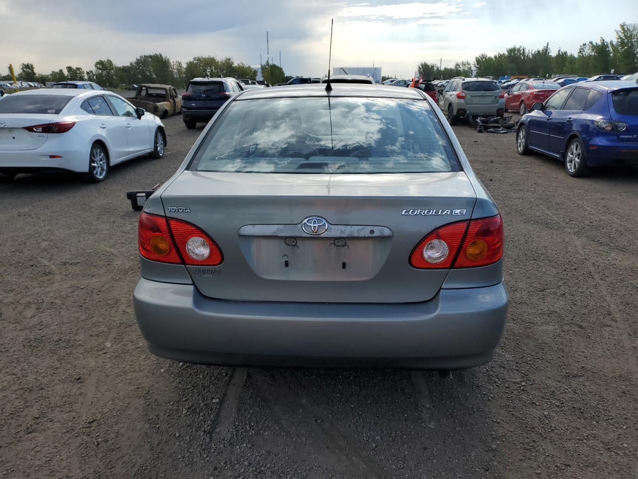 2003 Toyota Corolla Ce VIN: 2T1BR32E93C737409 Lot: 70869074