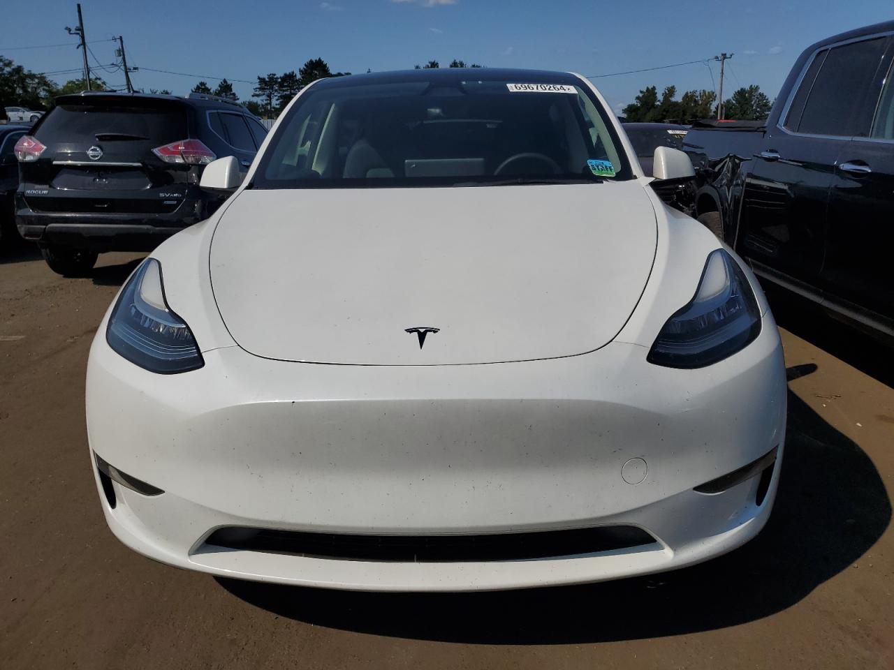 2023 Tesla Model Y VIN: 7SAYGDEE4PA136170 Lot: 69670264