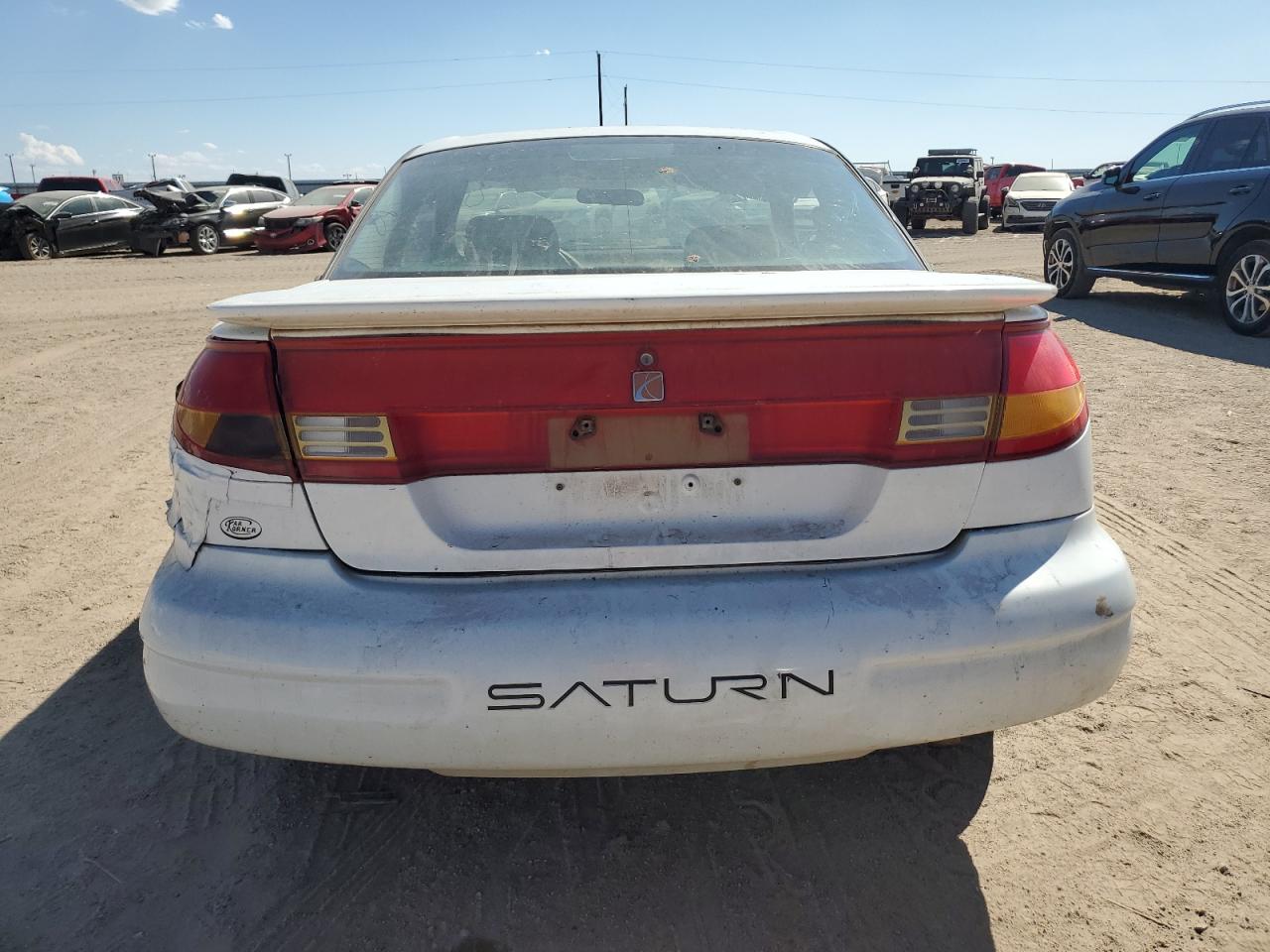 1999 Saturn Sc2 VIN: 1G8ZY1273XZ323247 Lot: 72400924