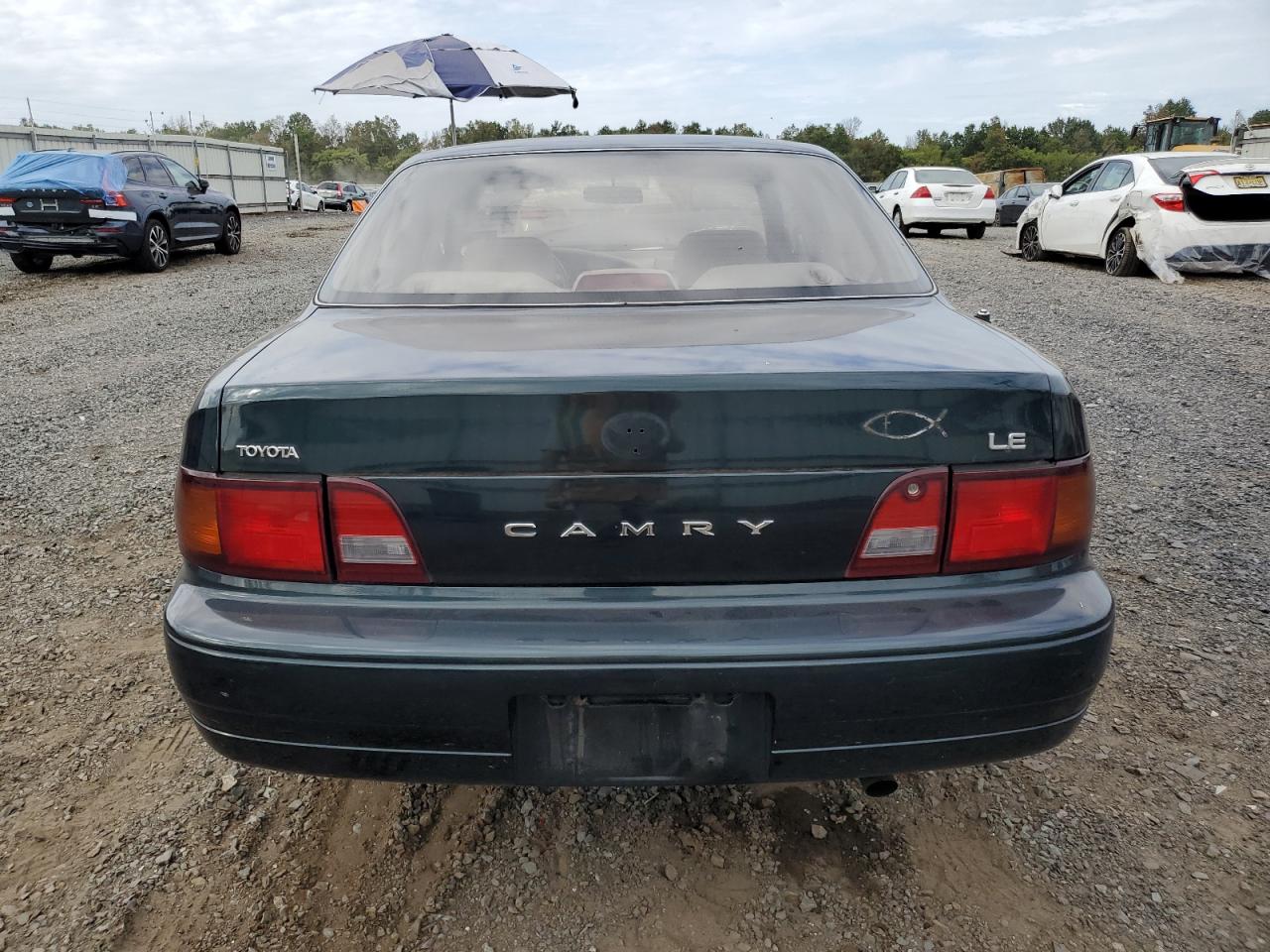 1995 Toyota Camry Le VIN: 4T1SK12E0SU583694 Lot: 72026224