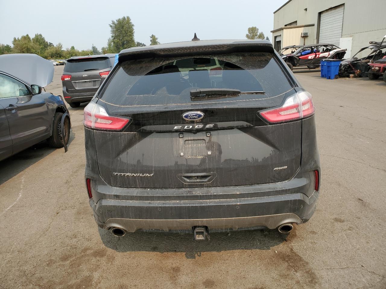 2021 Ford Edge Titanium VIN: 2FMPK4K94MBA10588 Lot: 69695214