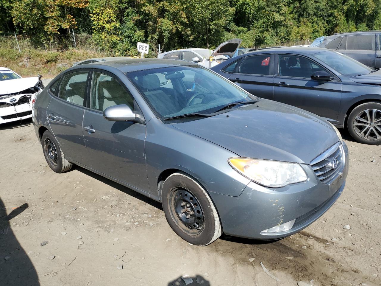 KMHDU4AD8AU076957 2010 Hyundai Elantra Blue