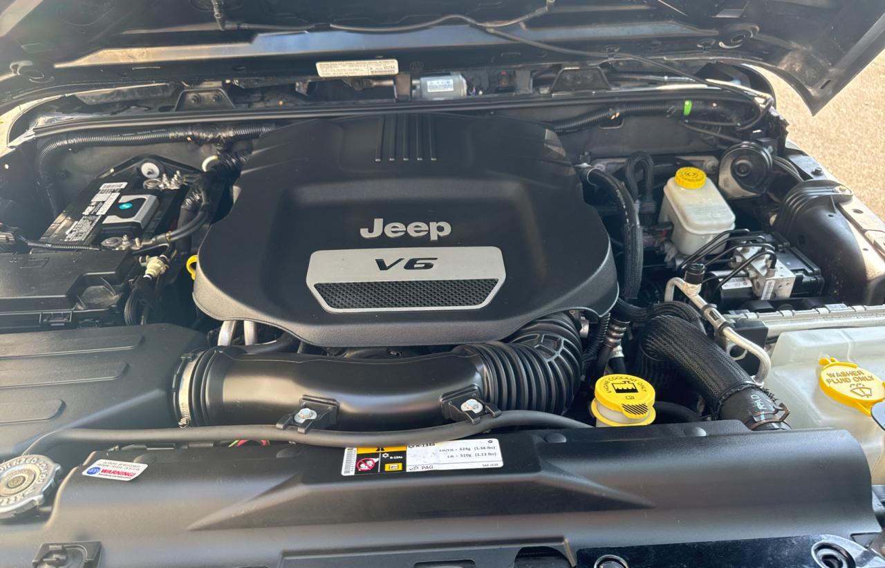 2014 Jeep Wrangler Unlimited Sahara VIN: 1C4BJWEG1EL210420 Lot: 70523844