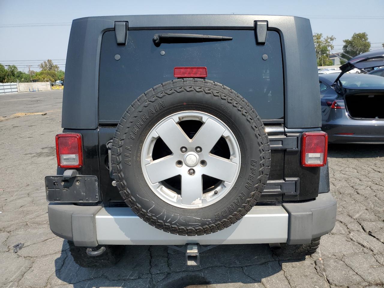 2010 Jeep Wrangler Unlimited Sahara VIN: 1J4HA5H19AL230088 Lot: 71328634