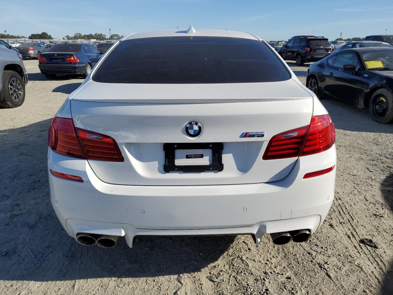 2014 BMW M5 VIN: WBSFV9C57ED097617 Lot: 70801784