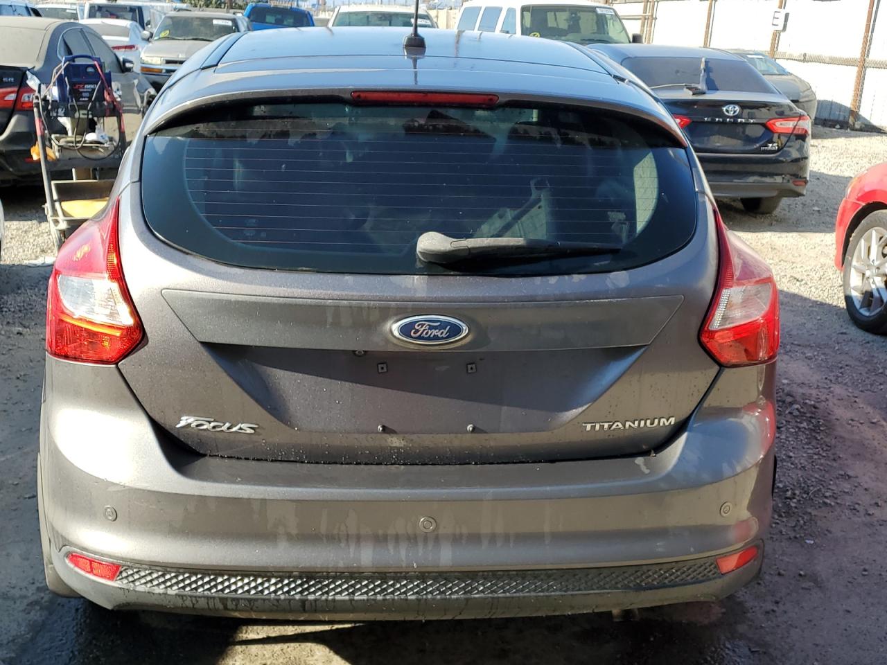 2012 Ford Focus Titanium VIN: 1FAHP3N21CL167731 Lot: 69990244