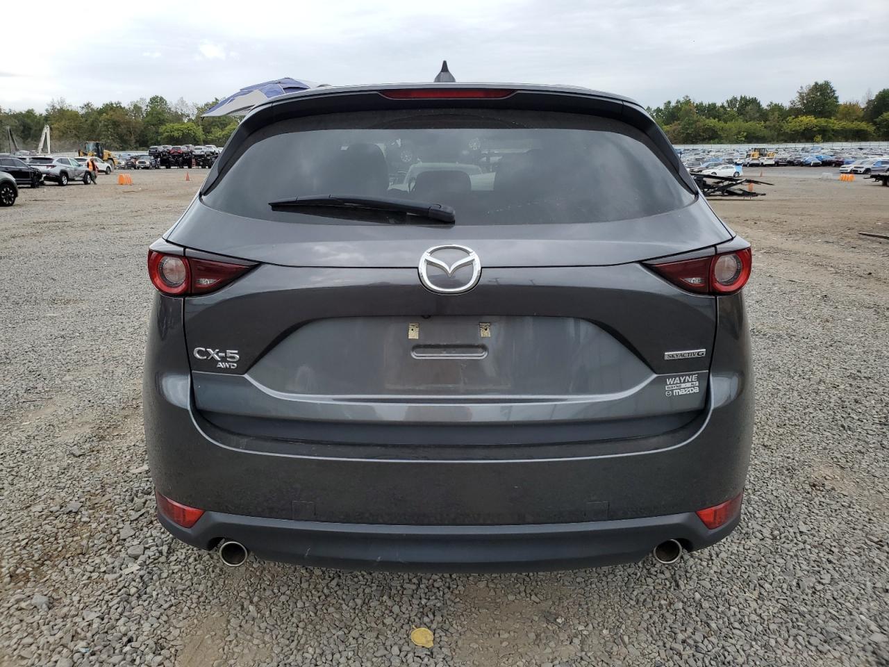 2021 Mazda Cx-5 Touring VIN: JM3KFBCM8M0450770 Lot: 72721934