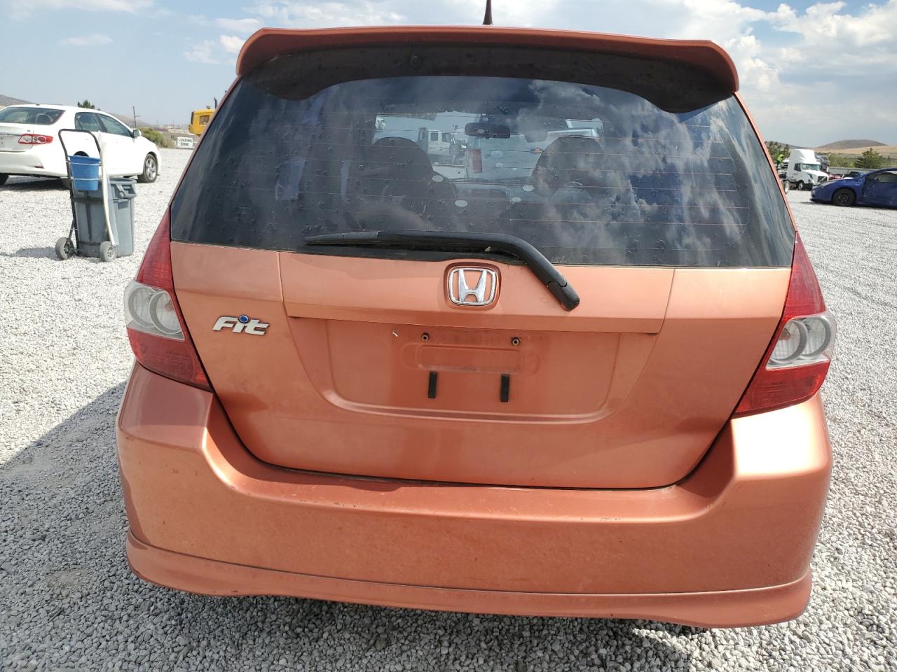 2007 Honda Fit S VIN: JHMGD38697S067058 Lot: 70517754